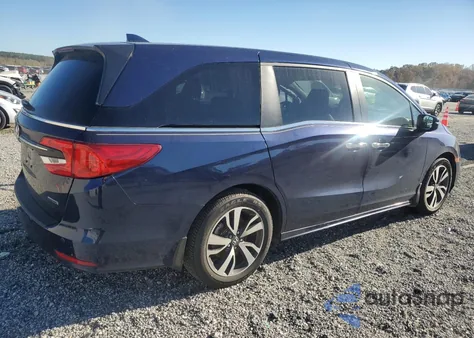 2021 Honda Odyssey Touring z USA, uszkodzony, nr VIN 5FNRL6H86MB028534